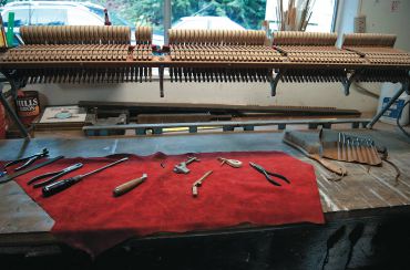 Below: A piano stack in process of repair