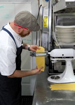 Chef Lyman preparing pasta