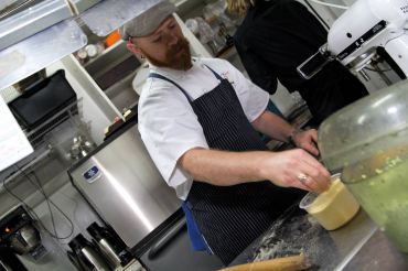 Chef Lyman preparing pasta