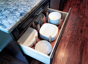 Peg board dish storage. (Photo courtesy A Kitchen That Works)