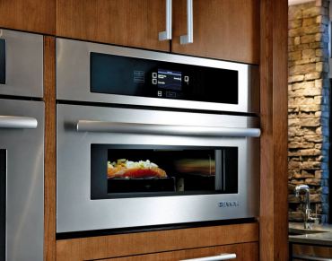 Jenn Air Convection Microwave with drop-down door — for cooks who want speed and convenience in one Model #JMC2430W