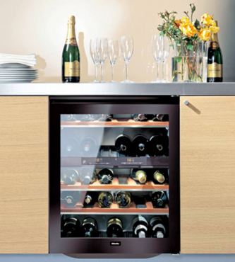 Miele wine refrigerator model No. KWT4154 is sleek and tucks nicely under a standard-height countertop with 38-bottle storage capacity and two temperature zones for red and white wine storage.