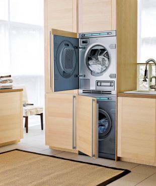 Asko model No. T793CFI/T793FI stackable front-loading washer and dryer is a great space saver while providing the option of being completely incognito. When not stacked, they fit neatly under a standard-height counter.