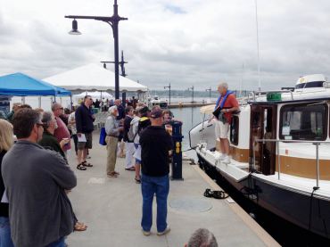 Visitors listen to a presenter at last year's National Marina Day.