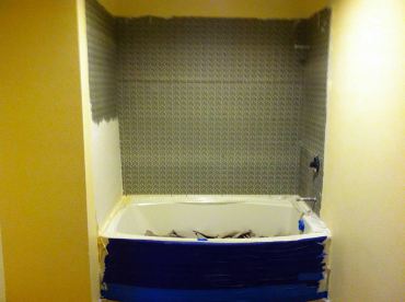 Fresh sheetrock with texture and densboard shower