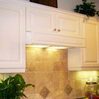 A retractable, flush-mount range hood made by Imperial Kitchen