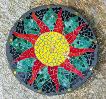 Completed sunflower stepping stone, with sealant applied.