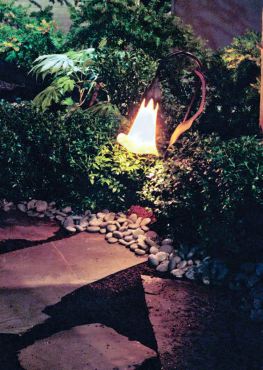 Landscape lighting illuminates pathways for moonlight strolls through the garden.