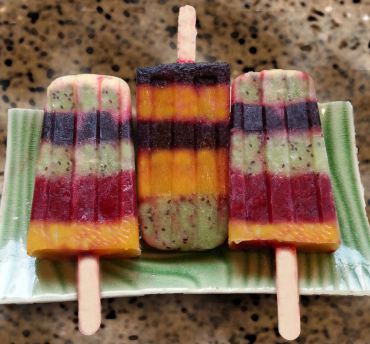 Frozen Popsicles: kiwi, mango, blueberry, raspberry and pineapple