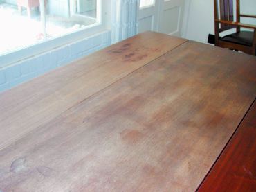 The drop-leaf table before being restored.