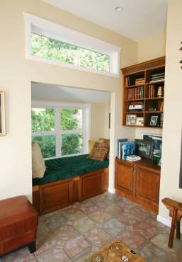 A space that may normally be unused became a cozy reading nook in this client home.