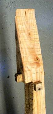 The top of the untreated post is cut at sharp angles where it will meet the roof of the box to allow room for bats to roost. (Photo by Carol McGhee)