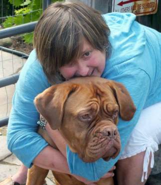 Lisa Infante with her French mastiff, Layla. (Photo by Carol Infante)