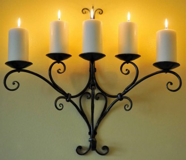 Traditionally styled scroll sconce.