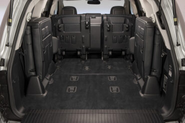 The rear seats on the Lexus LX570 fold up and out of the  way for ample cargo room.