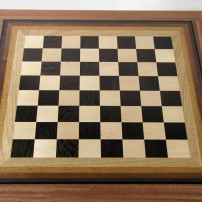 This John Steiner chessboard, made from anigre, mahogany, maple, walnut and wenge, has a slight glow to it. Steiner was trying to capture the color mechanics of iridescence by using gradations of wood color.