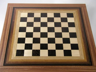 This John Steiner chessboard, made from anigre, mahogany, maple, walnut and wenge, has a slight glow to it. Steiner was trying to capture the color mechanics of iridescence by using gradations of wood color.