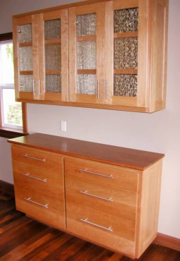 Brazilian cherry floor and cherry buffet and china cabinet made by John Steiner to complement a kitchen.