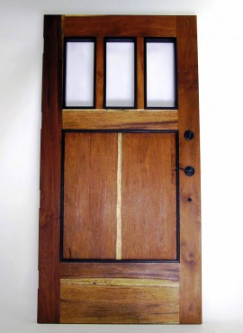 This entry door was made by Steiner from ifelele wood and complemented with the sapwood of the merbau and wenge trim.