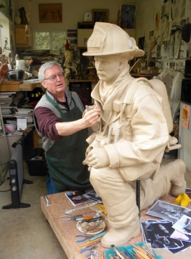 Sculptor John Jewell working on firefighter bronze for 9-11 memorial