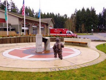 "Reflection Park" at West Pierce Fire & Rescue headquarters displays Jewell's "Contemplating Trade Center Steel" bronze sculpture and a part of the steel beam from the Trade Center.