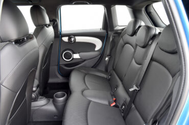 The rear seat is easily accessible and has room for adults if the front seats are up a ways.