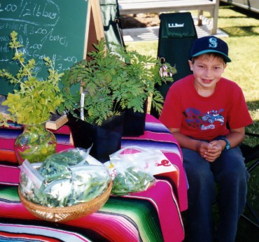 Selling their own grown produce at the farmers market gives kids the chance to share their passion.