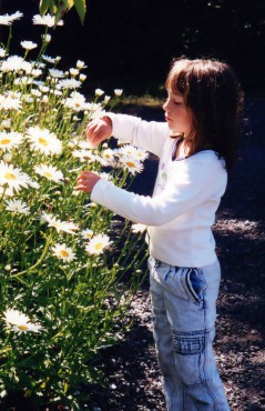 Kids love to explore plants and critters in the garden.