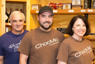 Peter Crabtree (center) with his parents, Glen and Colleen