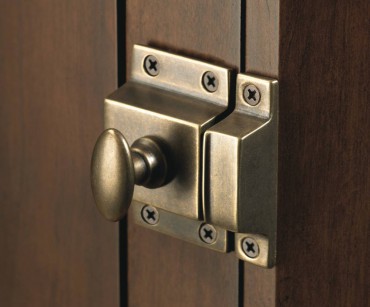 Cabinet latch in German bronze by Top Knobs