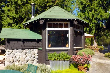 The Fortner bread oven extends outside the house, but is accessed from the inside.