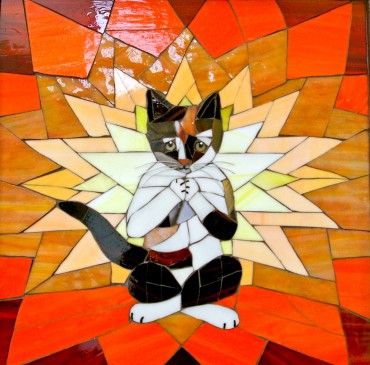 Tortoiseshell cat that stars on Yoga Mosaics' business card