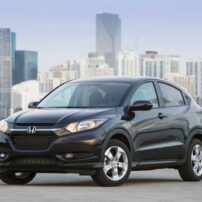 The 2016 Honda HR-V is a compact crossover SUV that resembles the larger Honda CR-V.