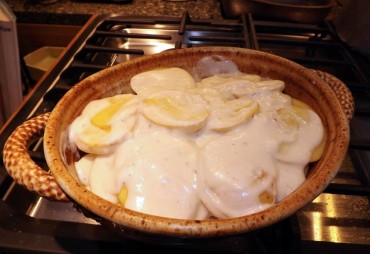 The casserole is ready to go into a conventional oven.