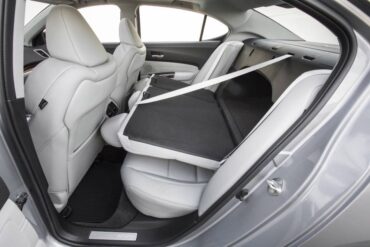 The split, folding rear seat provides cargo versatility, although the arched pass-through is somewhat limiting. 