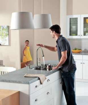 Moen's "motionsense" Delaney faucet functions at full water pressure when the sensor is activated.