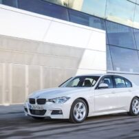 The 2016 BMW 330e looks like any other 3 Series BMW except for the small door in the left front fender.