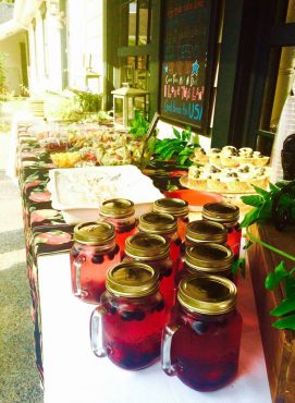 A salad buffet with beverages in mason jars is perfect outdoor food.