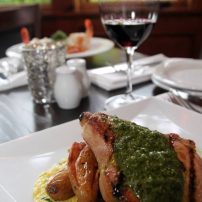 Manor House Restaurant - Grilled lan roc pork chop with roasted fingerlings, humita and chimichurri