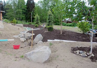 The second rain garden will collect runoff from their new home.