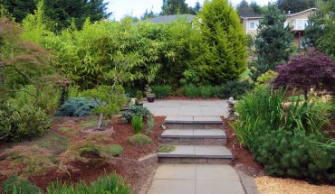 His Northwest/Zen garden with tai chi patio