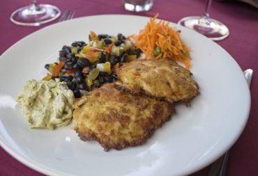 Morso Crab cakes with fiesta black beans and carrot slaw