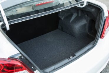 The trunk is spacious, but the lack of a folding rear seat limits cargo flexibility.