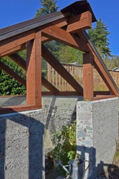 A sunken greenhouse created from an unsightly concrete dump on Bainbridge Island