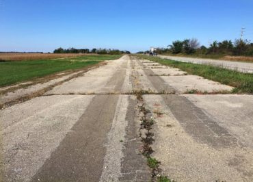 Much of the road is rough and uncared for, like this patch in Illinois.