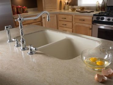 Solid-surface kitchen counter with integral sink in Tumbleweed by Corian (Photo courtesy Dupon)