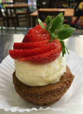 Flourless chocolate torte with coconut mousse and local berries