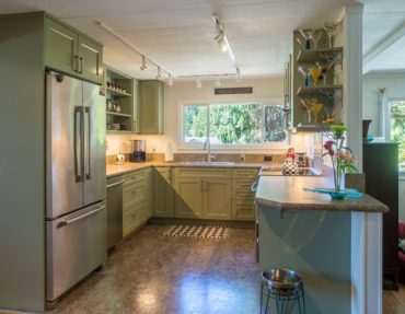 Stylish & Functional — Even in a small kitchen, you can get plenty of storage by using the space creatively.