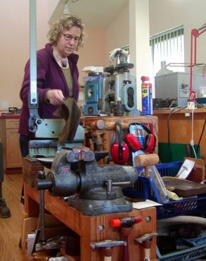 Tenenbaum has an extensive selection of tools and reference materials in her workshop. (Photo courtesy Charlee Glock-Jackson)