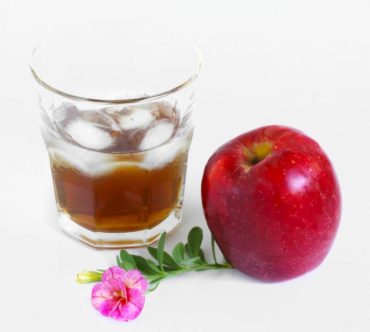 Caramel apple liqueur on the rocks has a luxurious flavor and is made from your apple harvest.